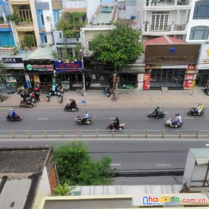 Bán nhà mt trường chinh - tân bình, dt 5.5 x 23, 3 tầng, 4pn giá 35 tỷ.