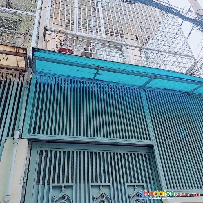 2 tầng đúc , xe hơi đỗ cửa thông thương , 2pn , 2 mặt tền , thống nhất , gò vấp ,2tyxx.
