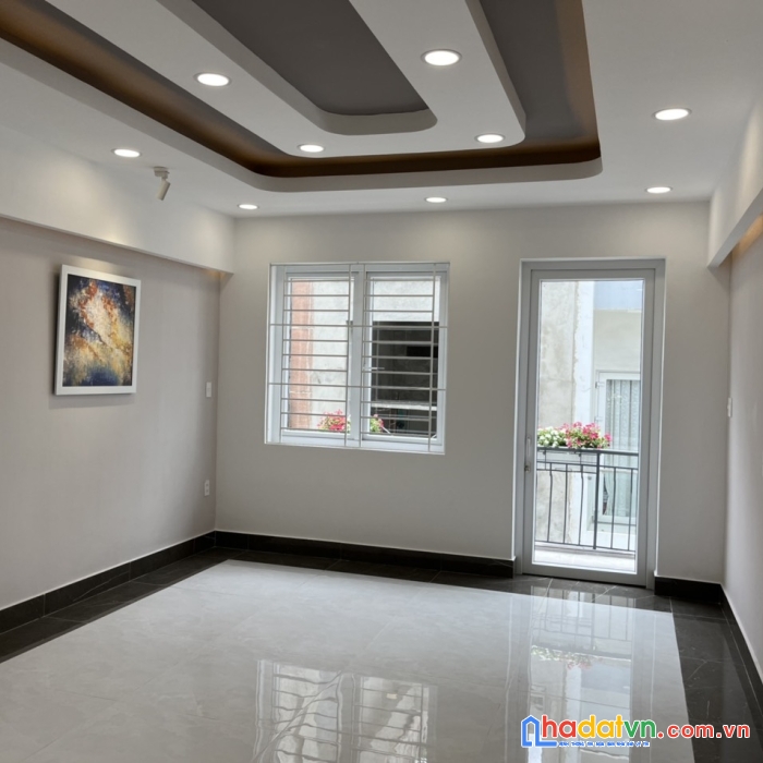 Nhà đẹp khu vip huỳnh văn bánh, pn dt nở hậu 4,1x14m cn 57,8m2 kc 4 tầng + st 12,5 tỷ tl o934056887