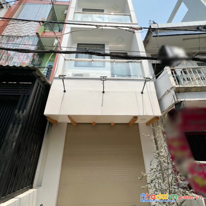 Nhà mới ( 2 lầu/st 4pn,5wc) chợ hồ thị kỷ đường trần bình trọng p1q10