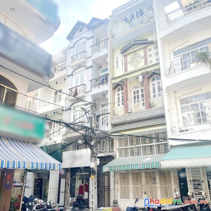 Nhà (5x16.3m) 4 tầng hẻm xe tải đường thành thái p12q10