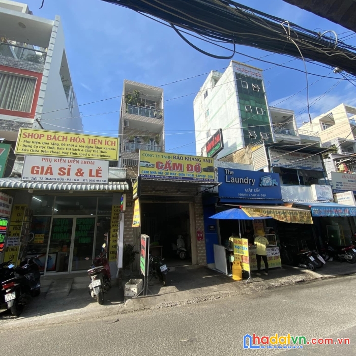 Bán  nhà mặt tiền tạ quang bửu quận 8 + kinh doanh nhộn nhịp ngày đêm, 4 tầng, 55m2, 11,5 tỷ.
