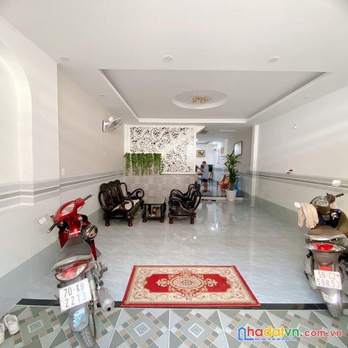 Cần bán căn nhà tại đường lâm văn bền, xe hơi đậu cửa, 5x15m. 4 tầng mới