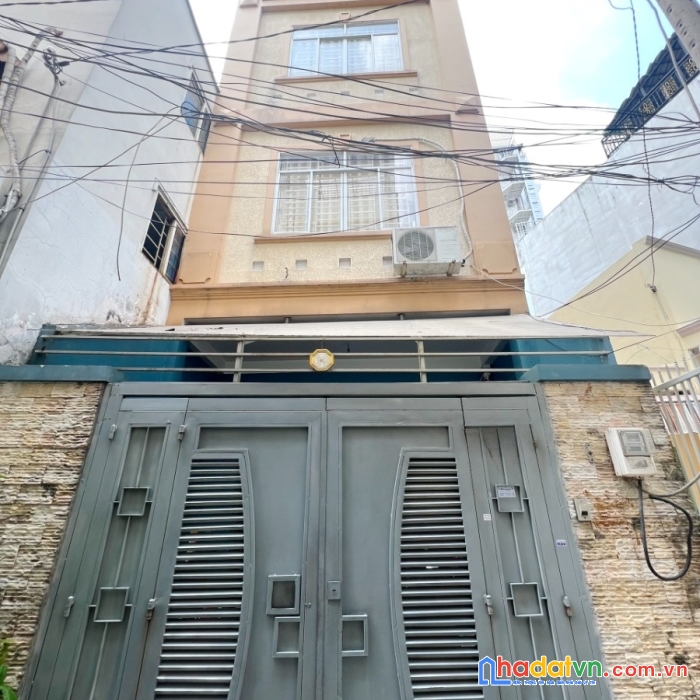 Nhà 4 tầng nở hậu l 9.7m hẻm xe hơi đường 3/2 p11q10