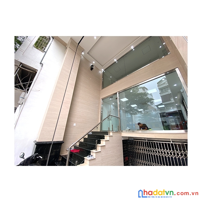 Bán gấp tòa nhà văn phòng xây mới 8 tầng lô góc mặt phố vọng. giá 58 tỷ