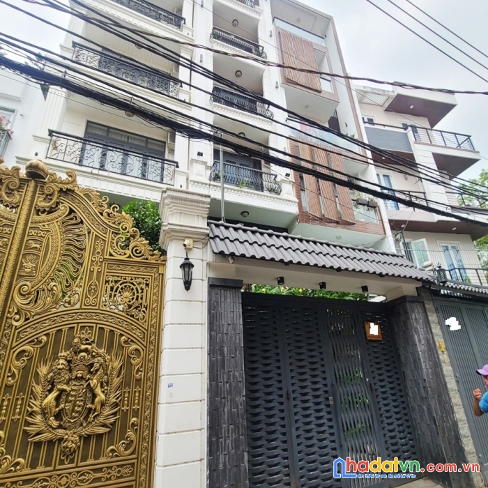 Mặt tiền nguyễn khuyến,4,5x15m,6 tầng sân để oto, thang máy. 10,5 tỷ.