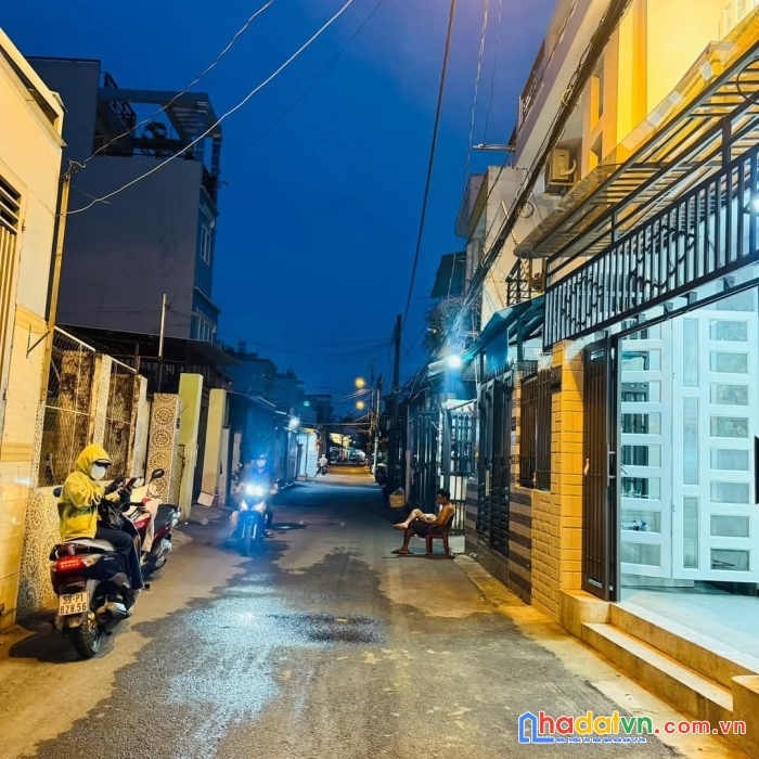 Bán nhà mặt tiền 4 tầng hẻm thông xe hơi p12 gò vấp