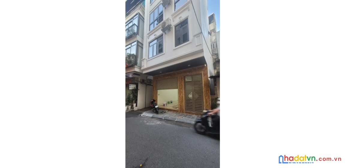 Nhà trần quý cáp. đống đa. thang máy. lô góc. ô tô. vỉa hè. dt 51m2. mt 5,5m. giá 19,7 tỷ.