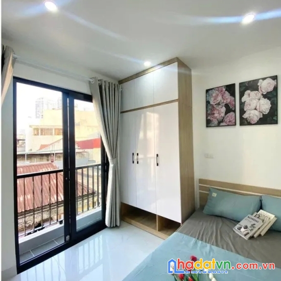 Bán nhà tôn thất tùng. đống đa. 7 tầng thang máy. dt 55m2. mt 5m. giá 13,4 tỷ.