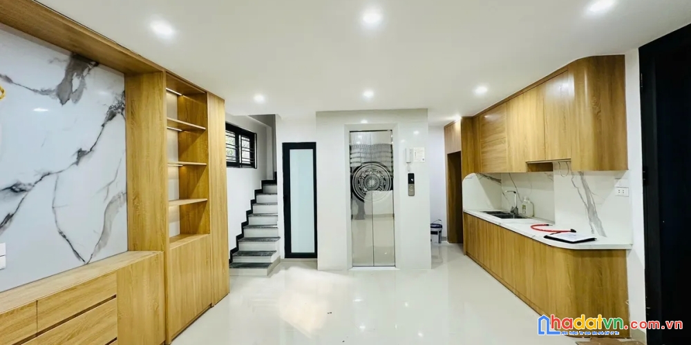 Bán nhà 2 mặt ngõ vũ thạnh. đống đa. 7 tầng thang máy. dt 32m2. mt 6.6m. giá 12.1 tỷ