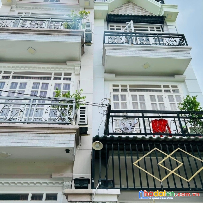 Bán nhà mặt tiền vĩnh hội phường 4 quận 4 dt 4 x 9 trệt 3 lầu - 8,95 tỉ . lh 0906889890