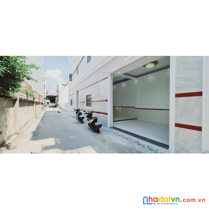 Bán nhà 1t2l căn góc 2 mặt tiền tân tiến, gần vincom, đường nhựa 2 xe hơi