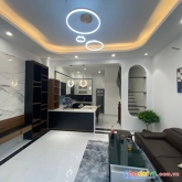 Nhà đẹp 3 mặt thoáng ô tô 7 chỗ vào nhà - dt: 52m - 4 tầng - 4 phòng ngủ -- mt: 5m - giá : 6.95 tỷ